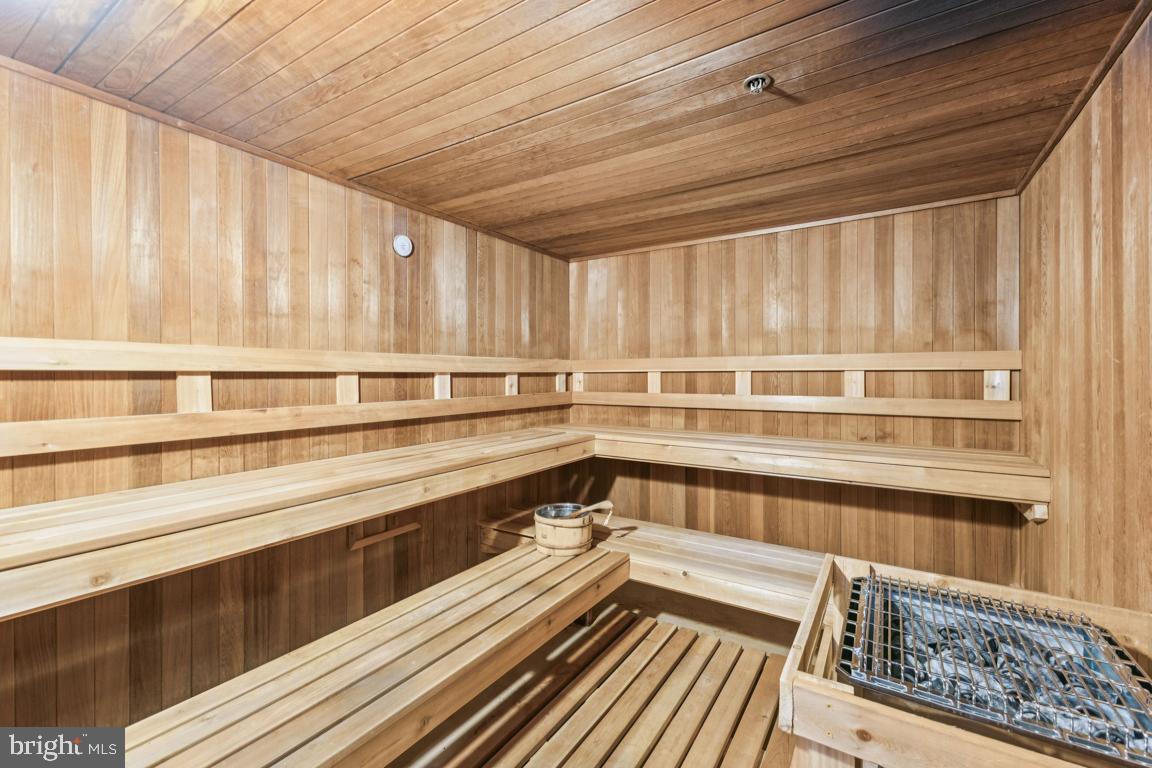 2151 Jamieson Avenue, Unit 1002 Alexandria, VA 22314 - Photo 22 of 25 a view of a large room with wooden floor and furniture
