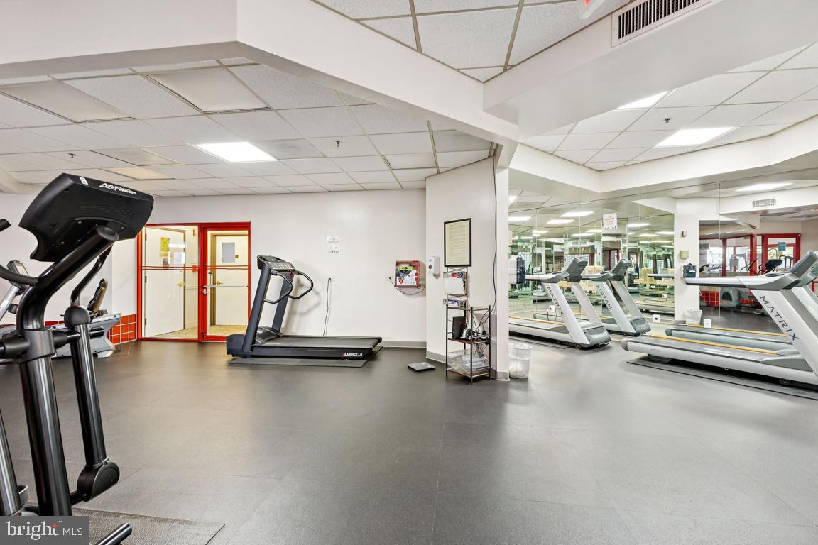 2151 Jamieson Avenue, Unit 1002 Alexandria, VA 22314 - Photo 23 of 25 a view of a room with gym equipment