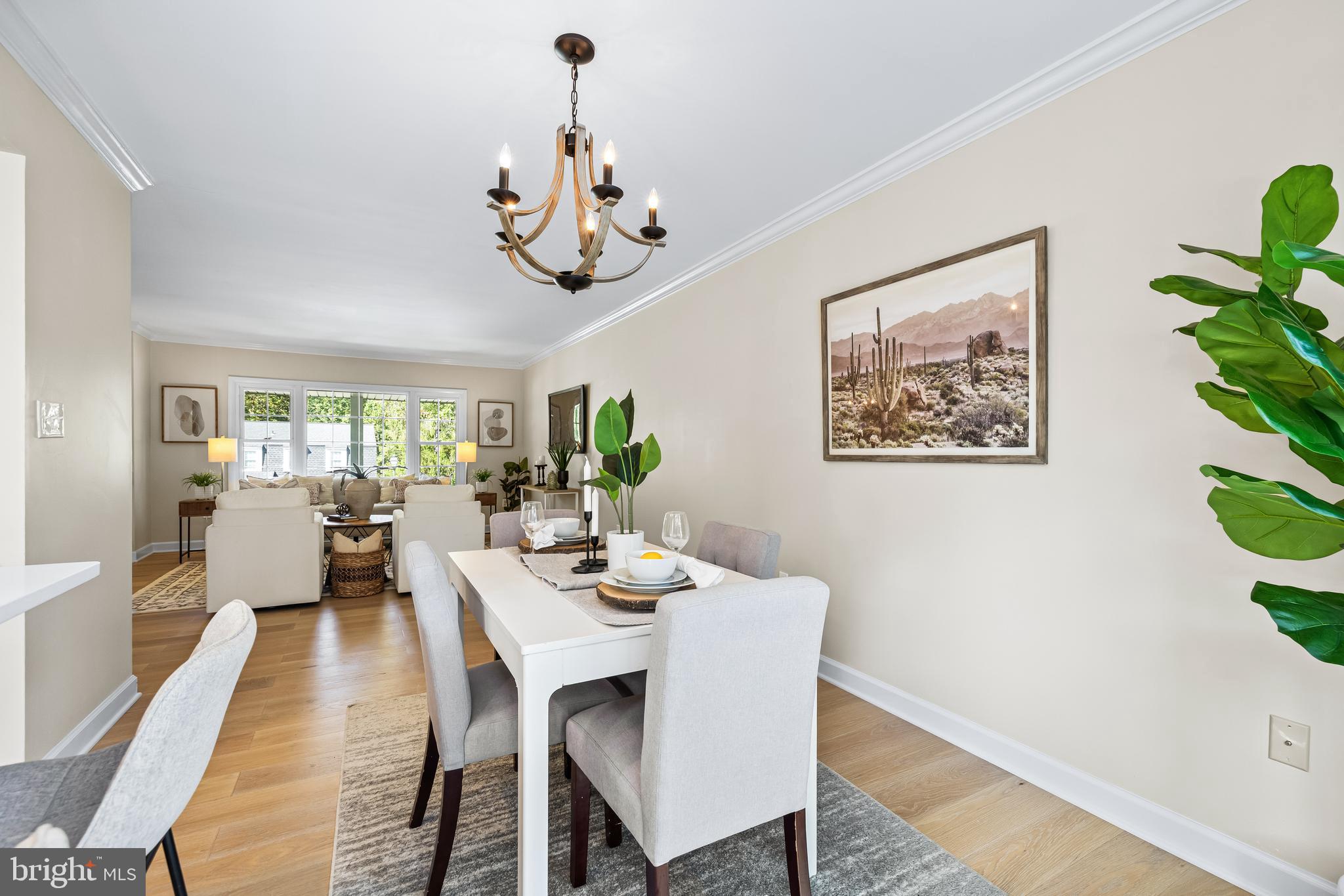 10845 Sandringham Road Cockeysville, MD 21030 - Photo 13 of 47 a view of a dining room with furniture window and wooden floor