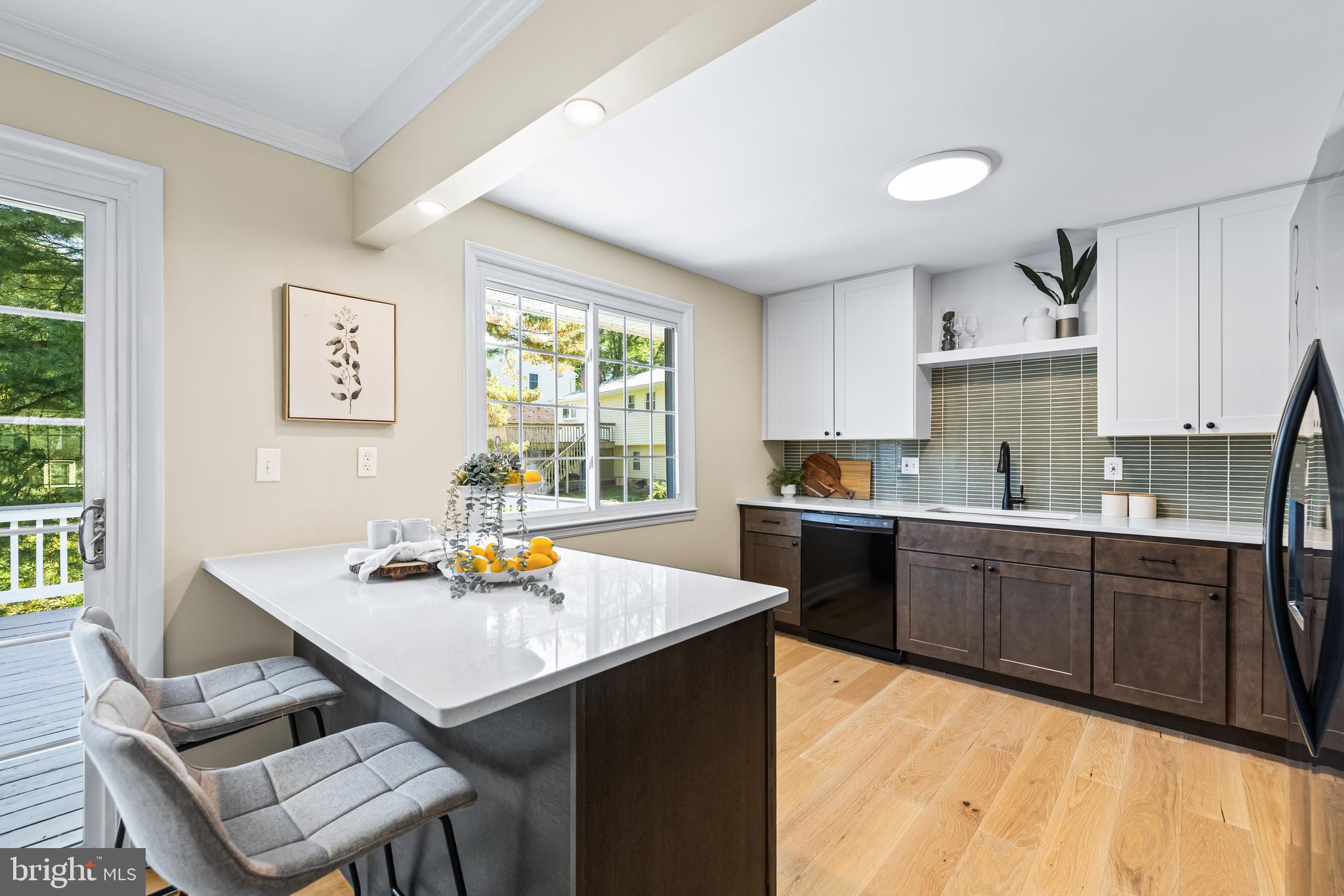 10845 Sandringham Road Cockeysville, MD 21030 - Photo 16 of 47 a kitchen with a sink cabinets and window