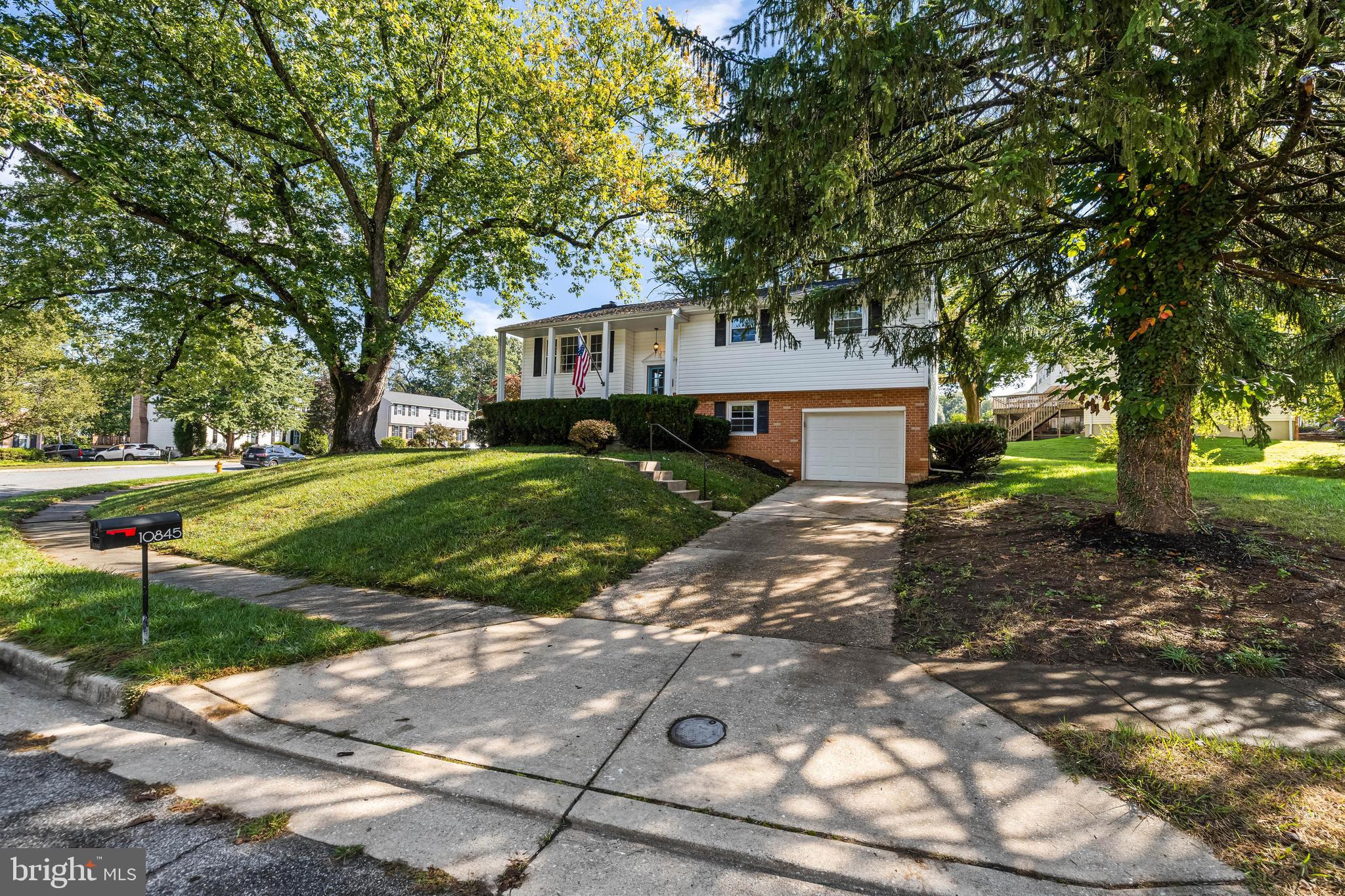 10845 Sandringham Road Cockeysville, MD 21030 - Photo 2 of 47 a front view of a house with a yard