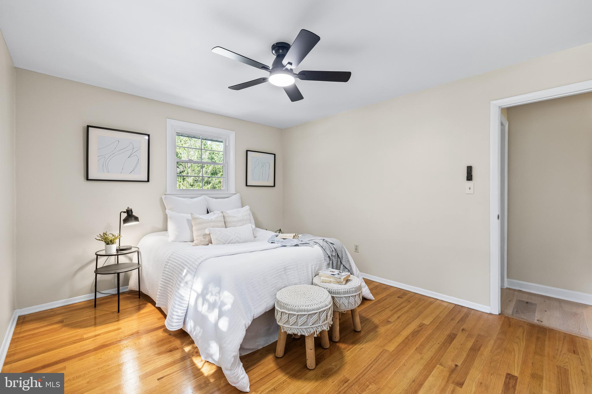 10845 Sandringham Road Cockeysville, MD 21030 - Photo 26 of 47 a bedroom with a bed and a chandelier