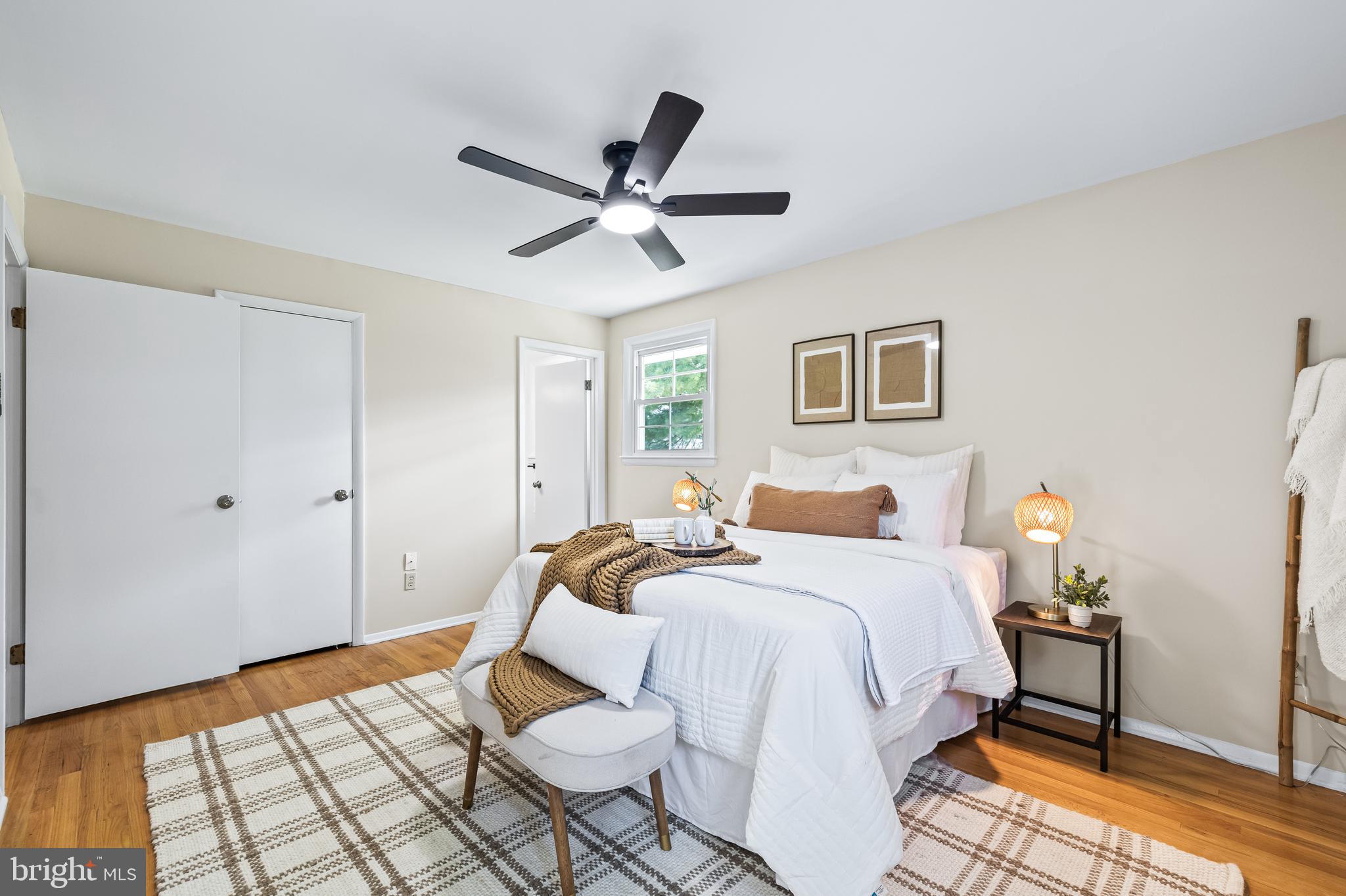 10845 Sandringham Road Cockeysville, MD 21030 - Photo 30 of 47 a bedroom with a bed and wooden floor