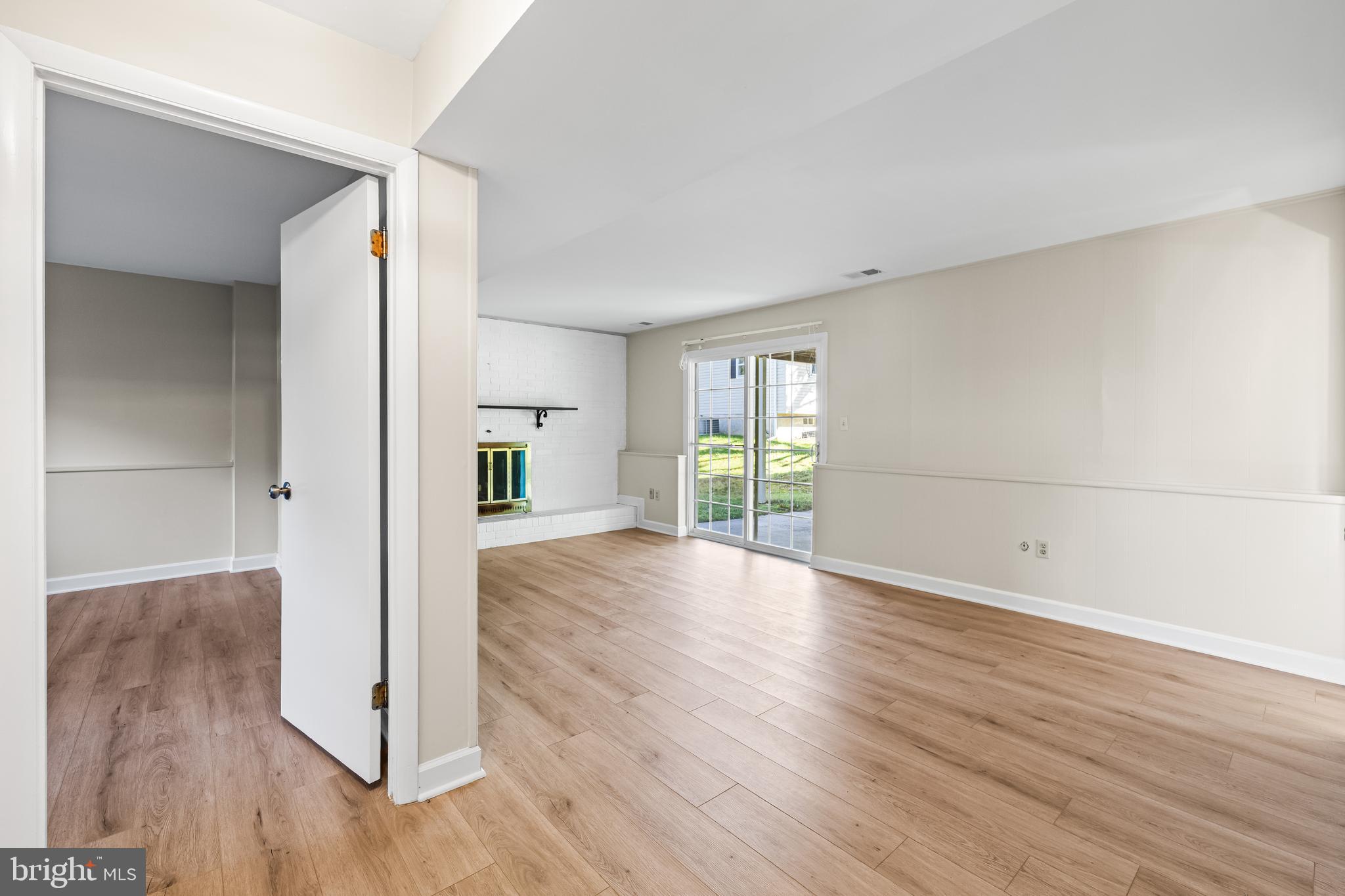 10845 Sandringham Road Cockeysville, MD 21030 - Photo 32 of 47 wooden floor in an empty room with a window