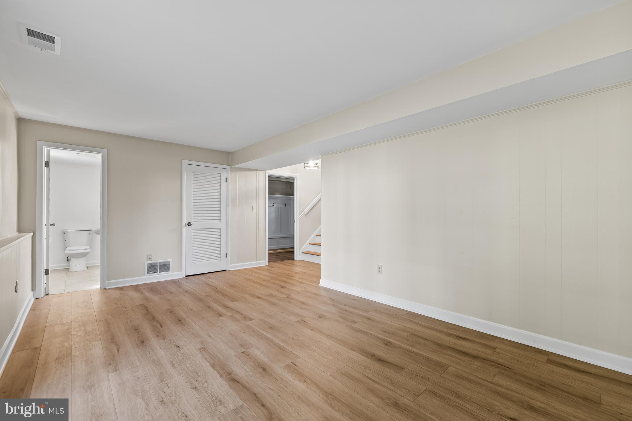 10845 Sandringham Road Cockeysville, MD 21030 - Photo 36 of 47 a view of an empty room and wooden floor