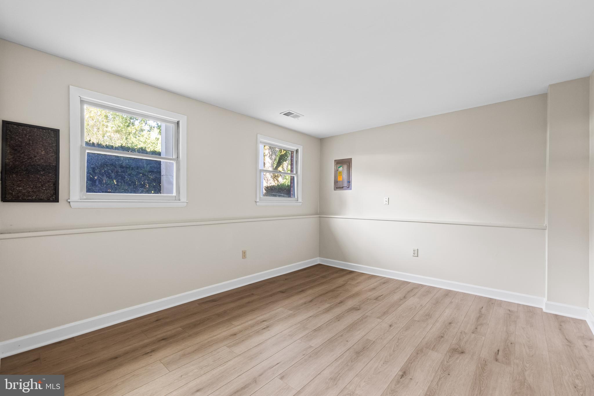 10845 Sandringham Road Cockeysville, MD 21030 - Photo 38 of 47 wooden floor in an empty room with a window
