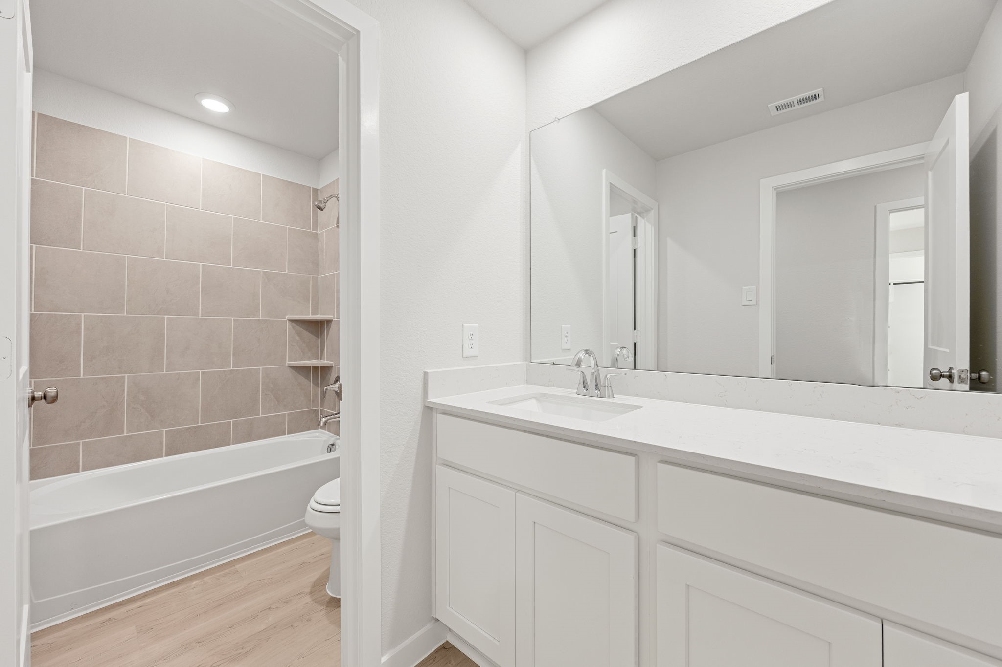 302 Brazen Forest Trail Magnolia, TX 77354 - Photo 14 of 22 a bathroom with a bathtub and a sink