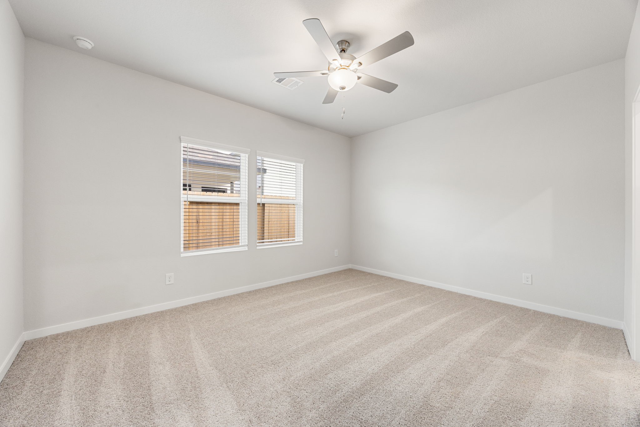 302 Brazen Forest Trail Magnolia, TX 77354 - Photo 9 of 22 a view of an empty room with a window