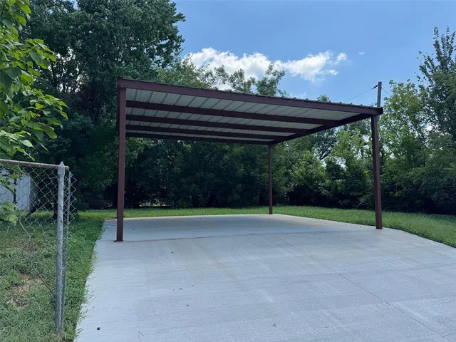 a view of outdoor space with deck and yard