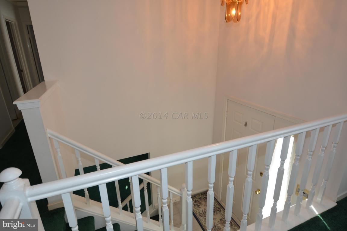 12 Mist Flower Road Ocean Pines, MD 21811 - Photo 11 of 42 a view of staircase with railing and white walls
