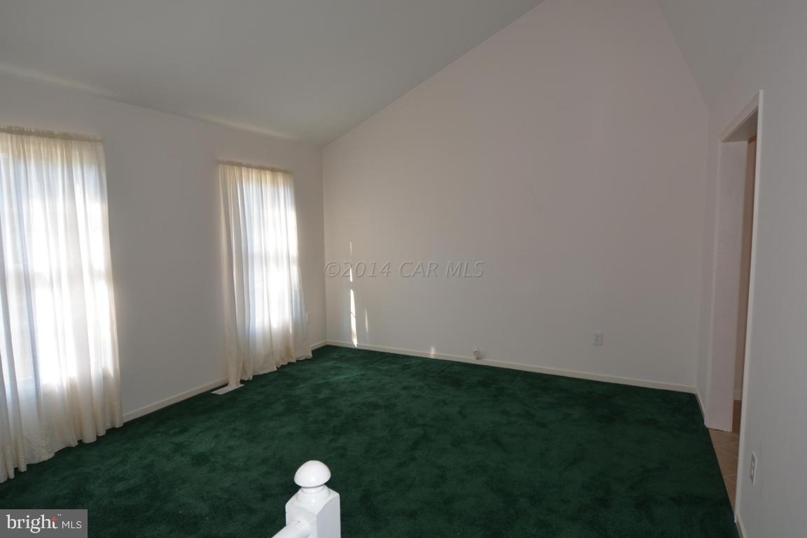 12 Mist Flower Road Ocean Pines, MD 21811 - Photo 14 of 42 a view of a room with windows and chair