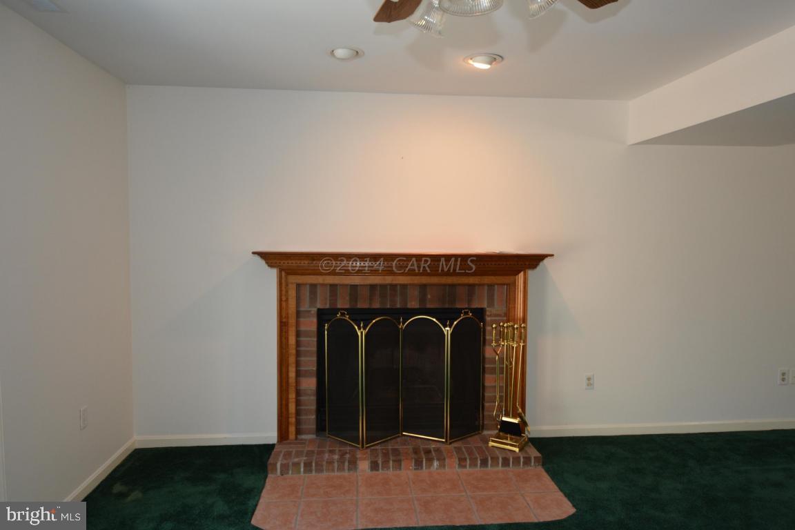 12 Mist Flower Road Ocean Pines, MD 21811 - Photo 3 of 42 a view of a livingroom with a fireplace