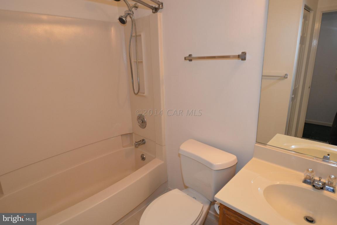 12 Mist Flower Road Ocean Pines, MD 21811 - Photo 25 of 42 a bathroom with a sink toilet and shower