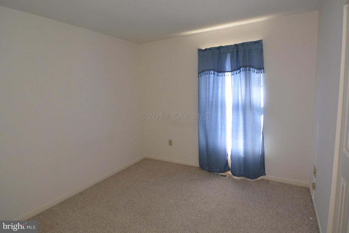 12 Mist Flower Road Ocean Pines, MD 21811 - Photo 31 of 42 an empty room with windows and closet