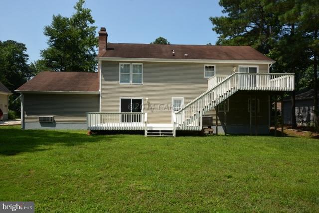 12 Mist Flower Road Ocean Pines, MD 21811 - Photo 41 of 42 a front view of a house with a garden