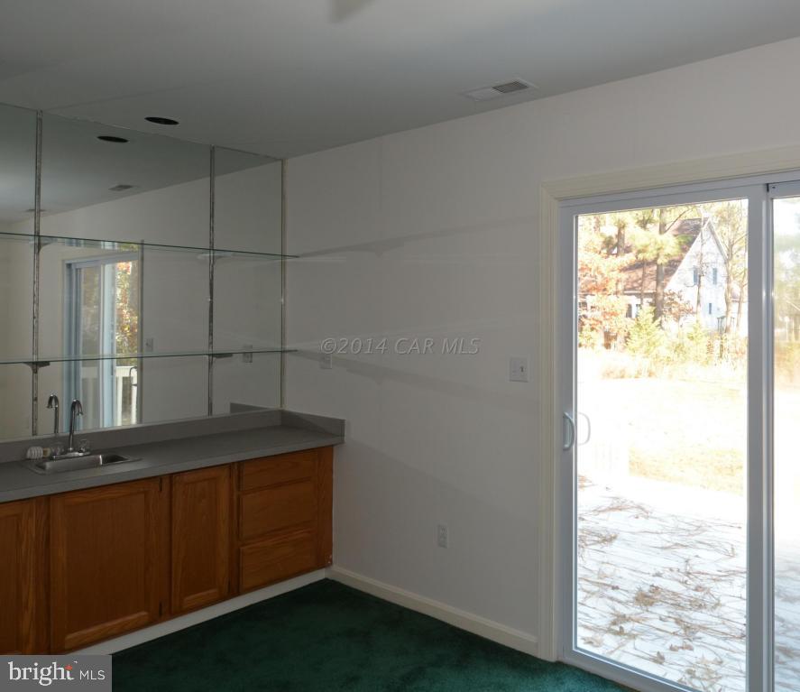 12 Mist Flower Road Ocean Pines, MD 21811 - Photo 7 of 42 a bathroom with a sink and a window