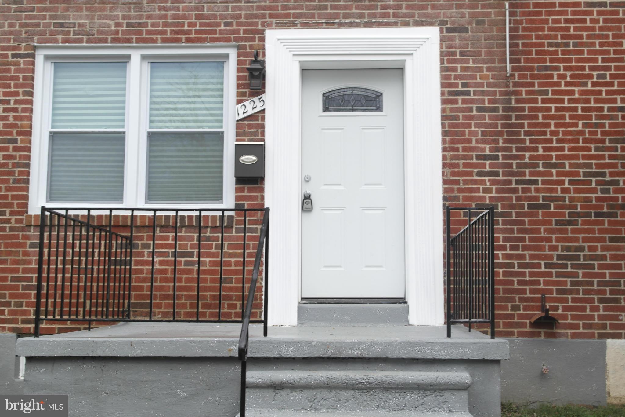 1225 Wicklow Road Baltimore, MD 21229 - Photo 1 of 17 a view of a door of a house with a door