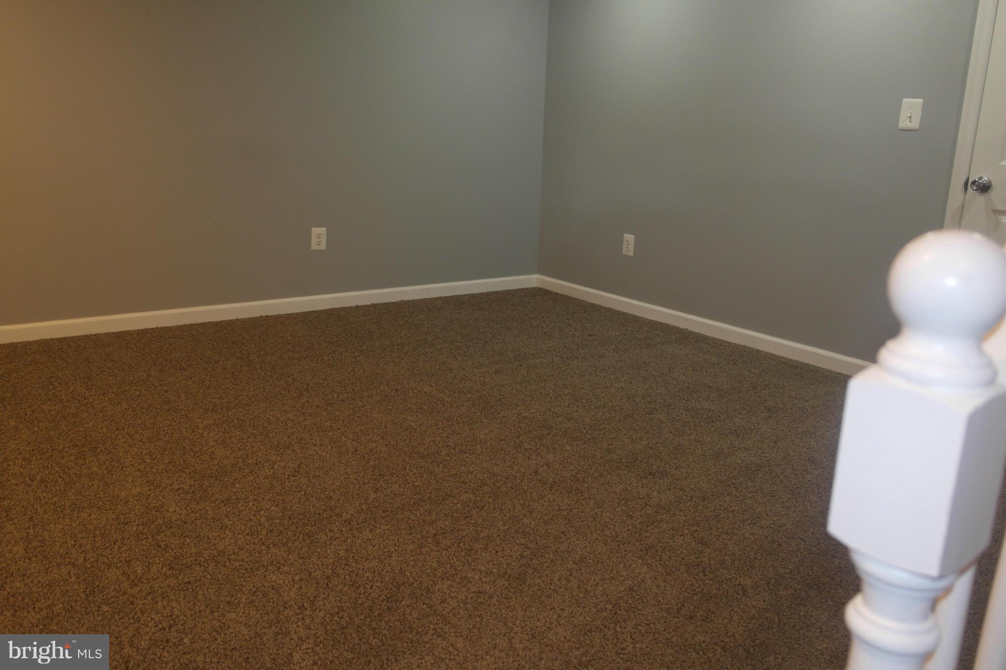 1225 Wicklow Road Baltimore, MD 21229 - Photo 16 of 17 a view of a room with wooden floor