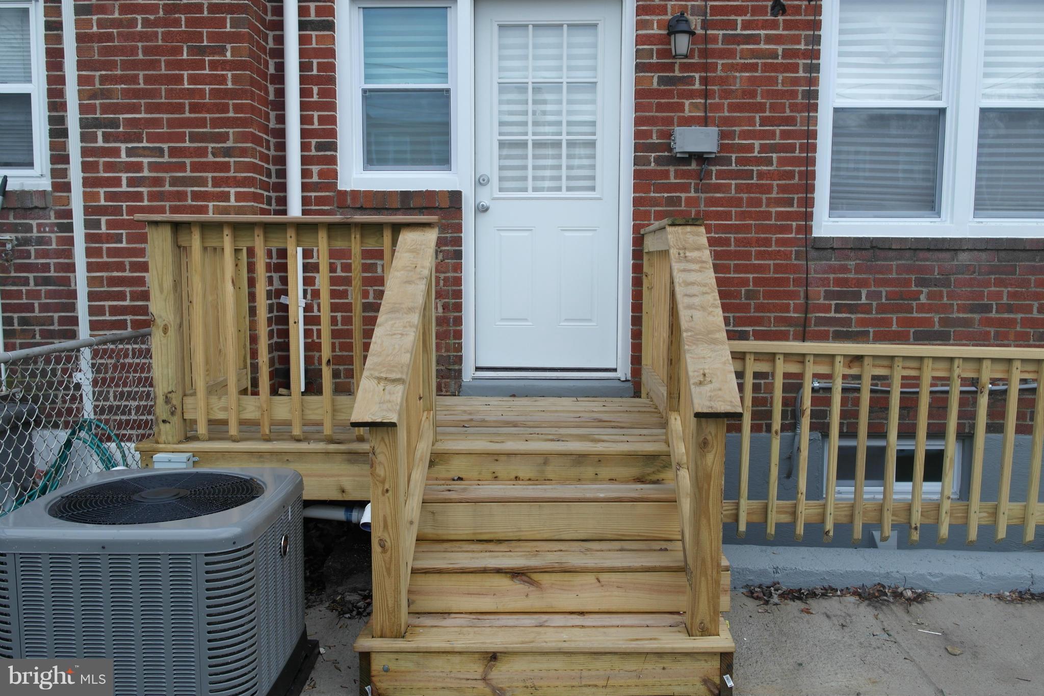1225 Wicklow Road Baltimore, MD 21229 - Photo 17 of 17 a front view of a house with a sink and barbeque oven
