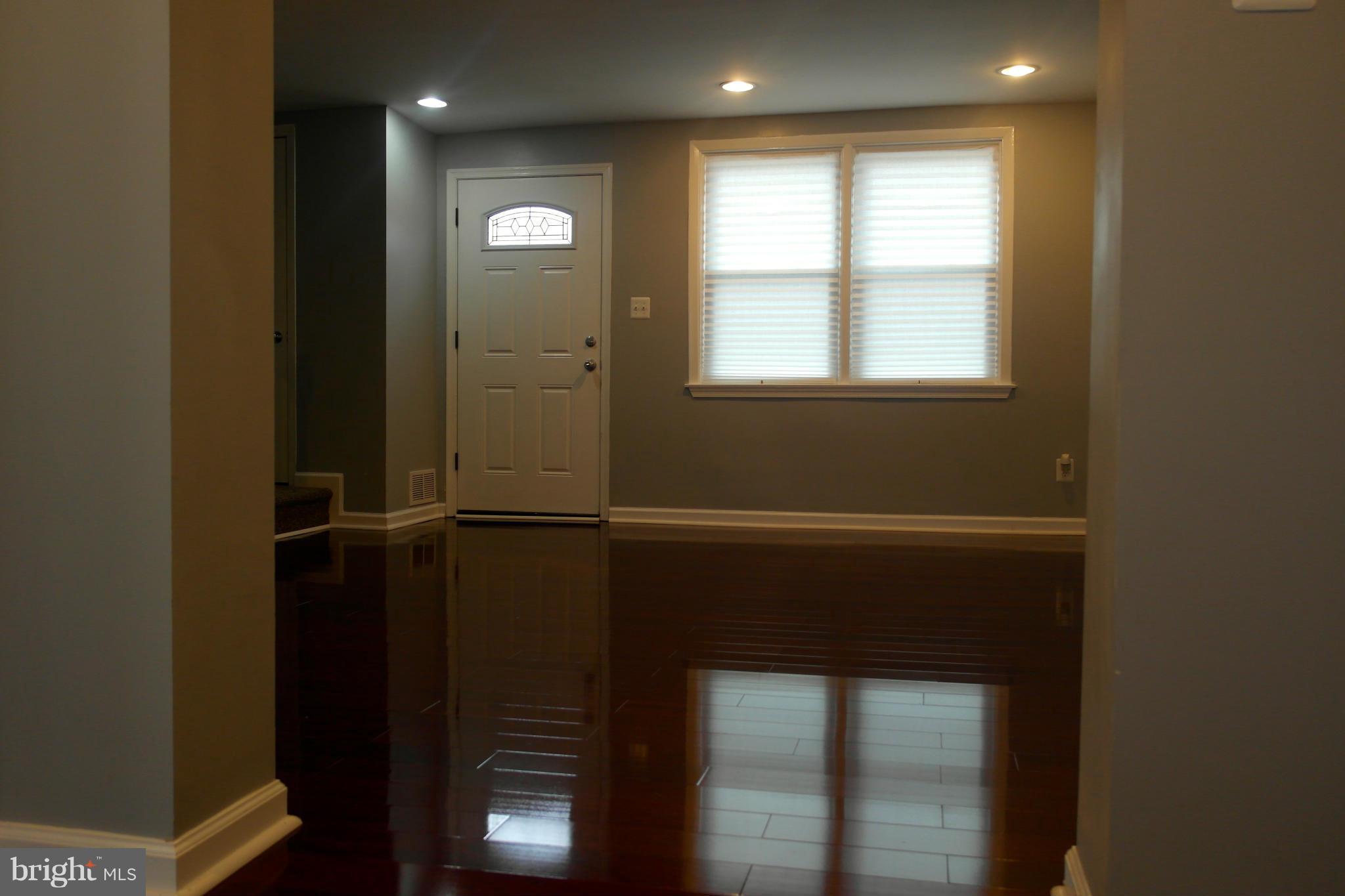 1225 Wicklow Road Baltimore, MD 21229 - Photo 3 of 17 a view of an empty room with closet area