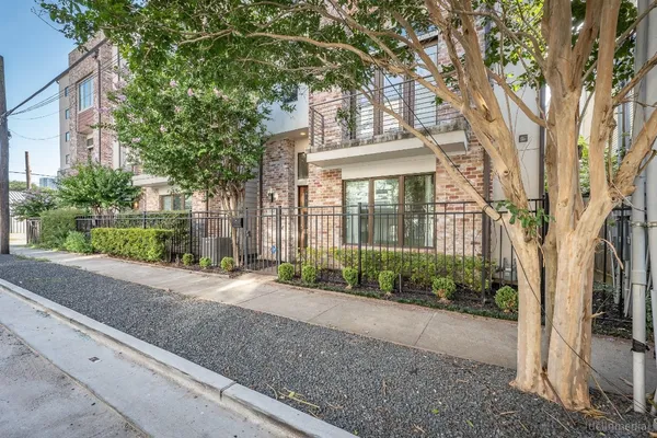 a view of a house with a street
