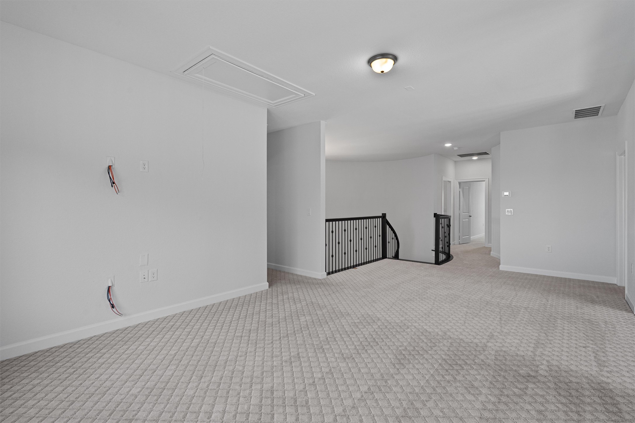 208 Lodestone Lane Austin, TX 78738 - Photo 22 of 38 Empty room featuring carpet floors and attic access
