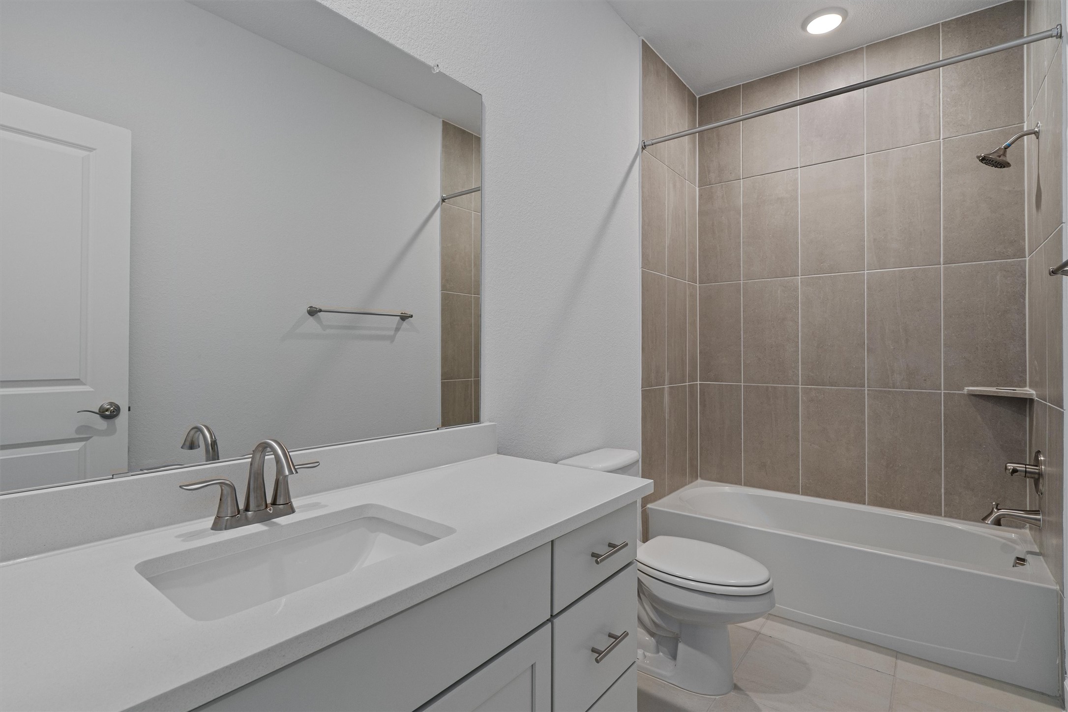 208 Lodestone Lane Austin, TX 78738 - Photo 27 of 38 Full bath with vanity and shower combination