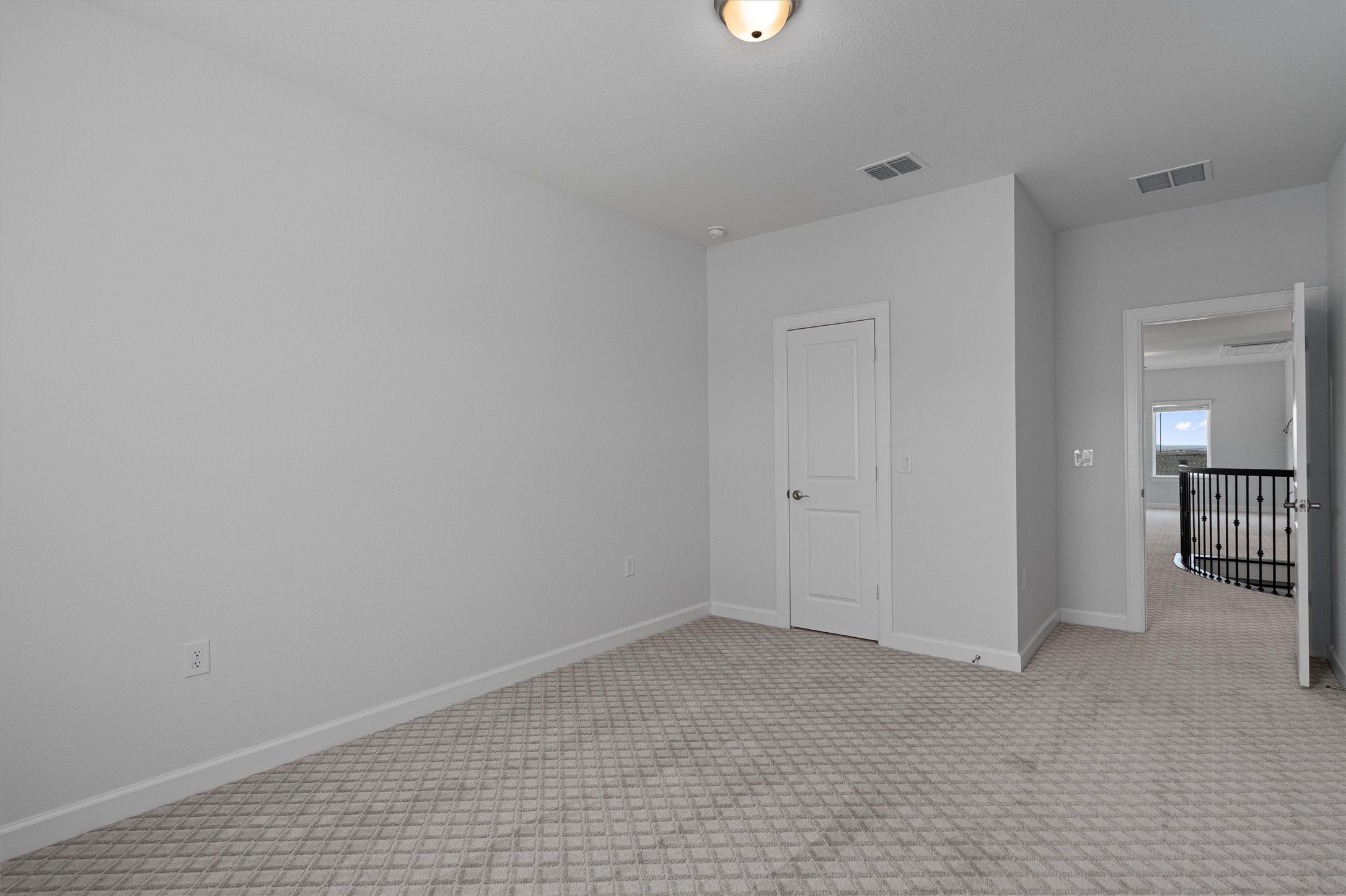 208 Lodestone Lane Austin, TX 78738 - Photo 28 of 38 Carpeted empty room with baseboards