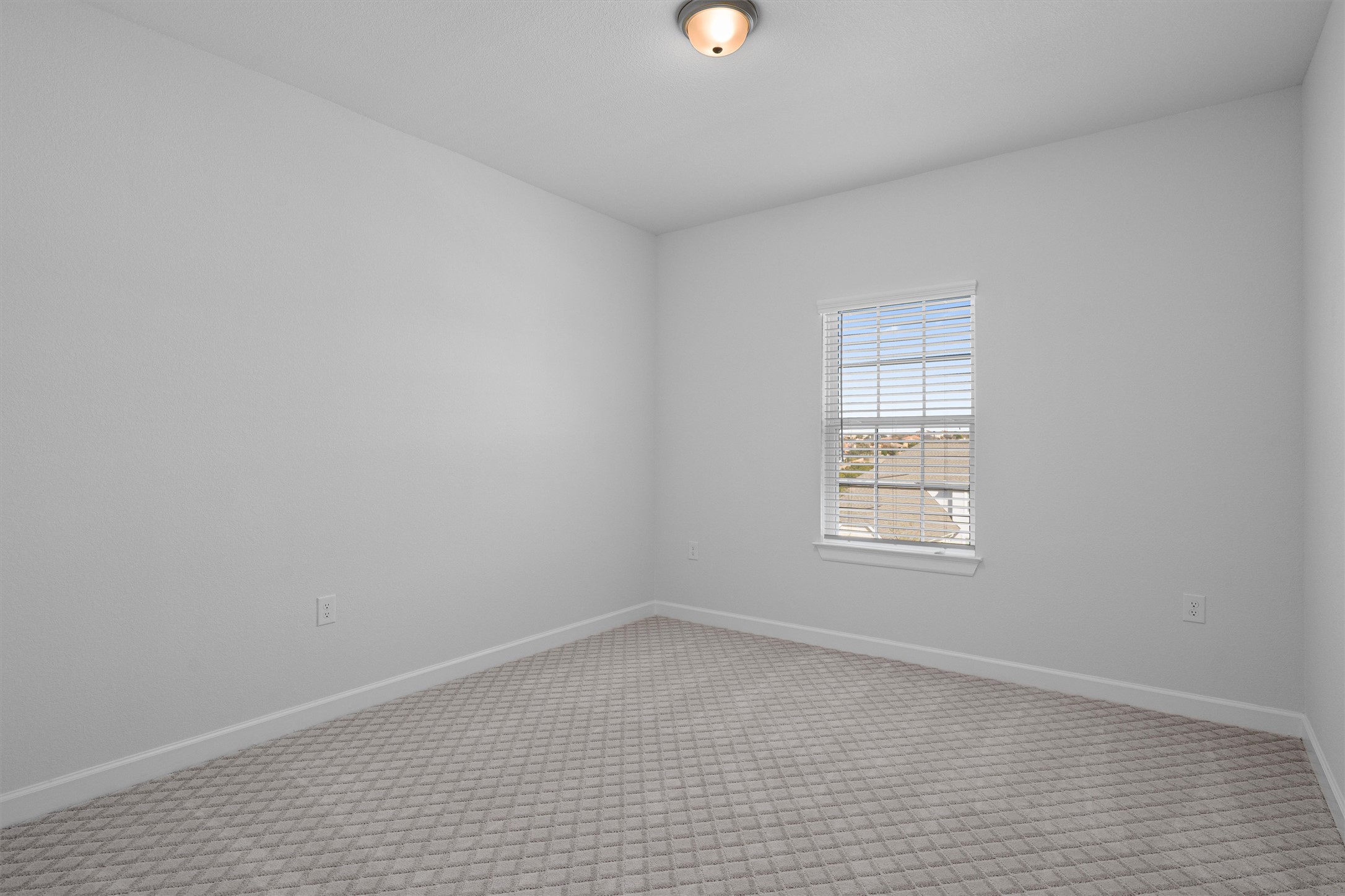 208 Lodestone Lane Austin, TX 78738 - Photo 29 of 38 Carpeted empty room featuring baseboards