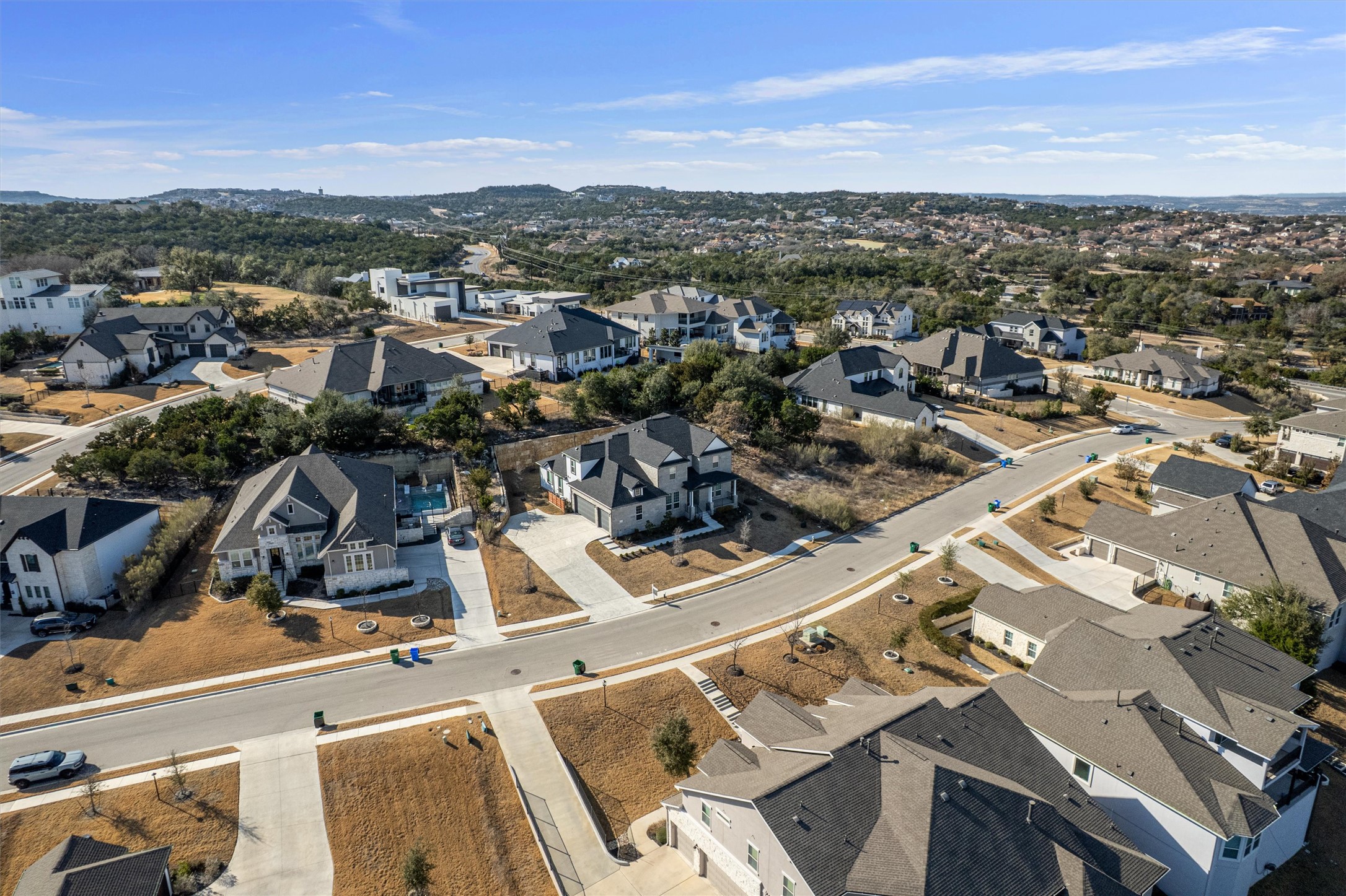 208 Lodestone Lane Austin, TX 78738 - Photo 3 of 38 Aerial perspective of suburban area