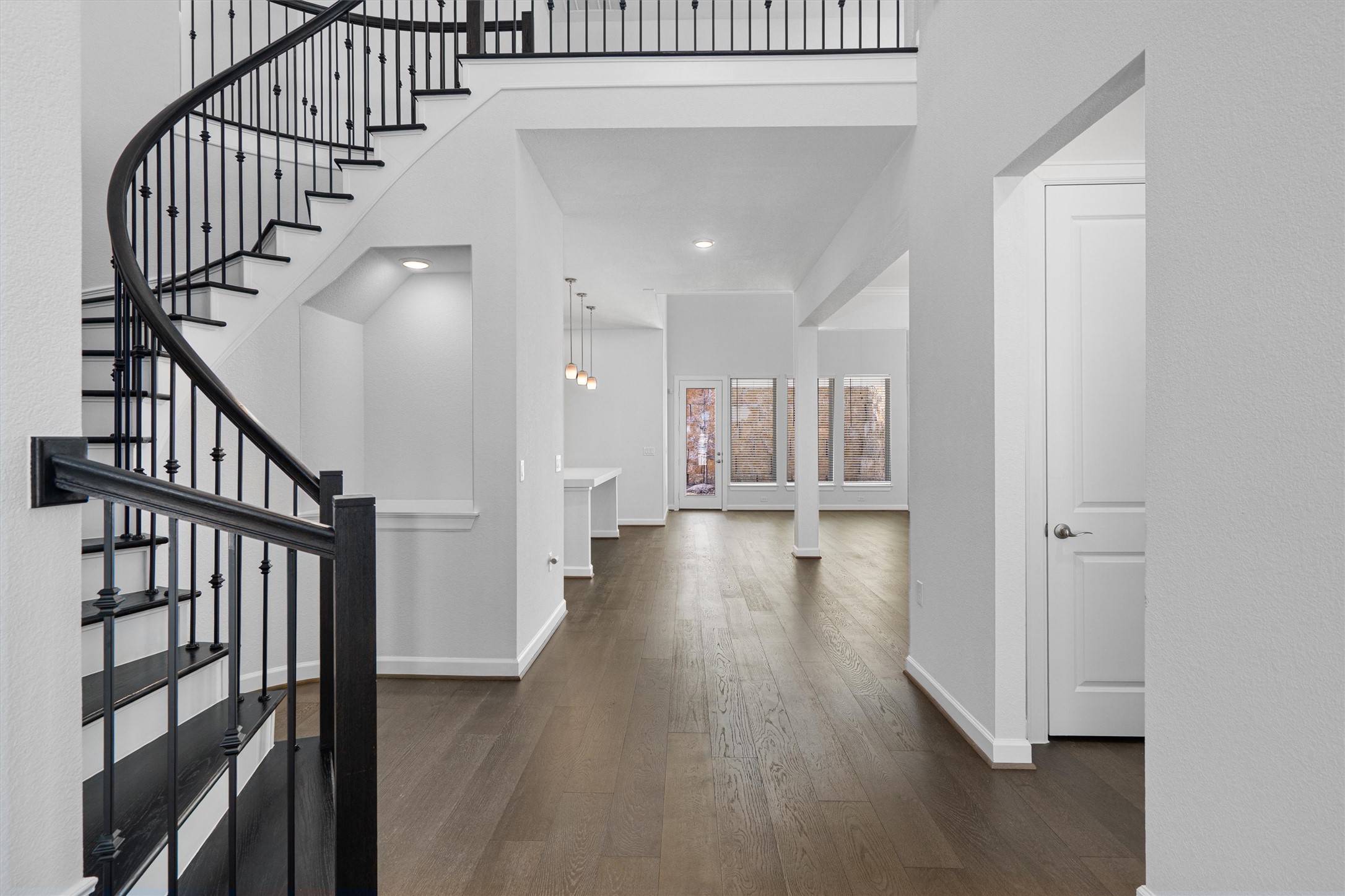 208 Lodestone Lane Austin, TX 78738 - Photo 4 of 38 Foyer featuring dark wood-type flooring and recessed lighting