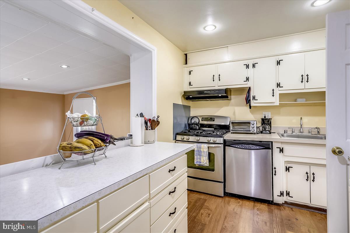13206 May Court Silver Spring, MD 20906 - Photo 11 of 30 Kitchen with opening to addition Family room