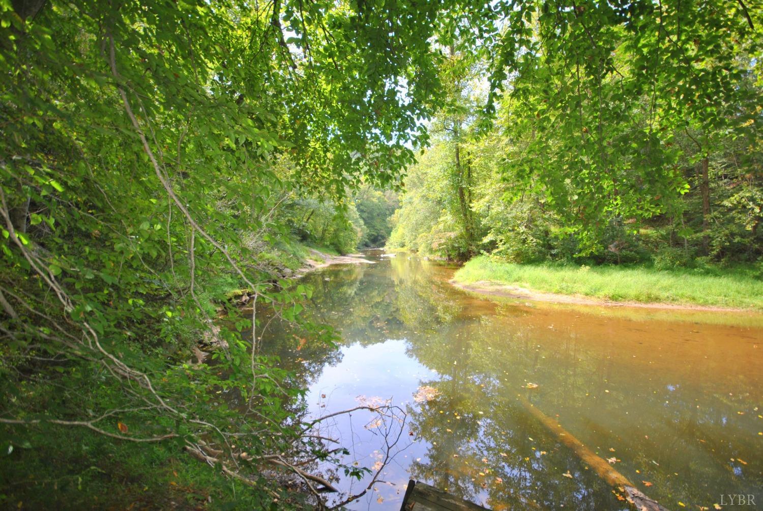 1206 East Perch Road Monroe, VA 24574 - Photo 48 of 83 a view of a lake from a yard