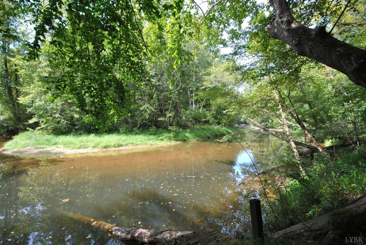 1206 East Perch Road Monroe, VA 24574 - Photo 49 of 83 a view of a lake from a yard