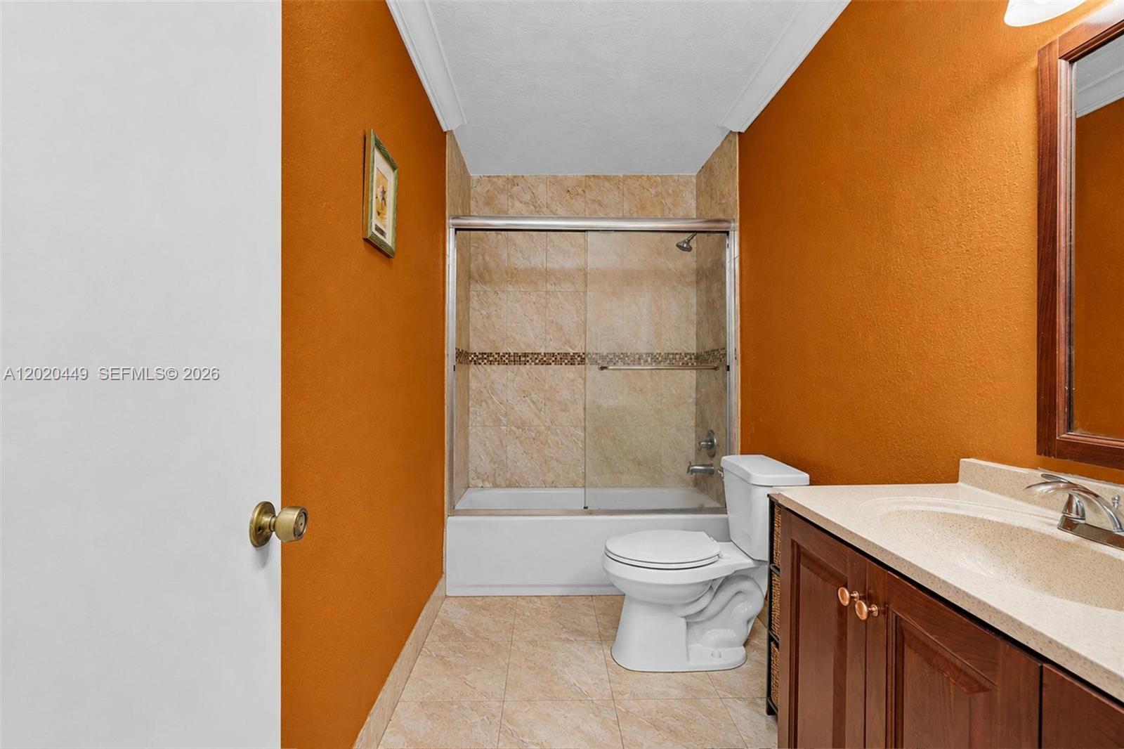 11061 Southwest 163rd Street Miami, FL 33157 - Photo 15 of 42 a bathroom with a granite countertop sink toilet and shower