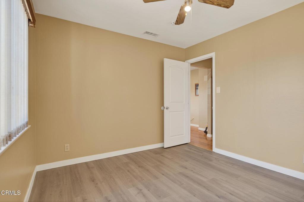 4029 South B Street Oxnard, CA 93033 - Photo 23 of 34 a view of an empty room with wooden floor