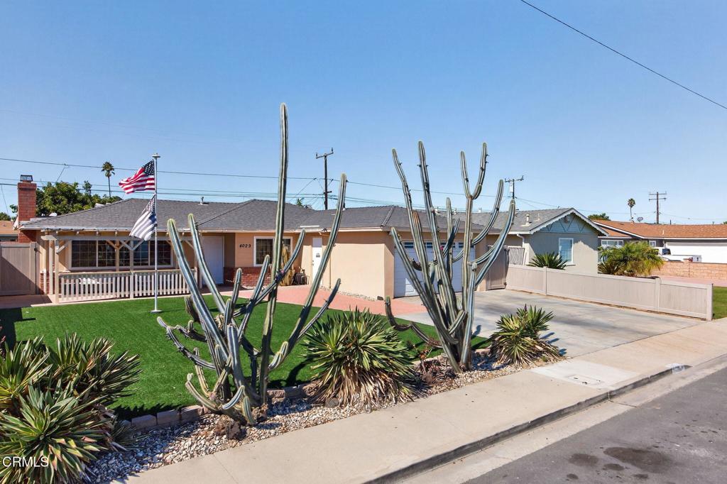 4029 South B Street Oxnard, CA 93033 - Photo 3 of 34 a view of a house with a yard and sitting area