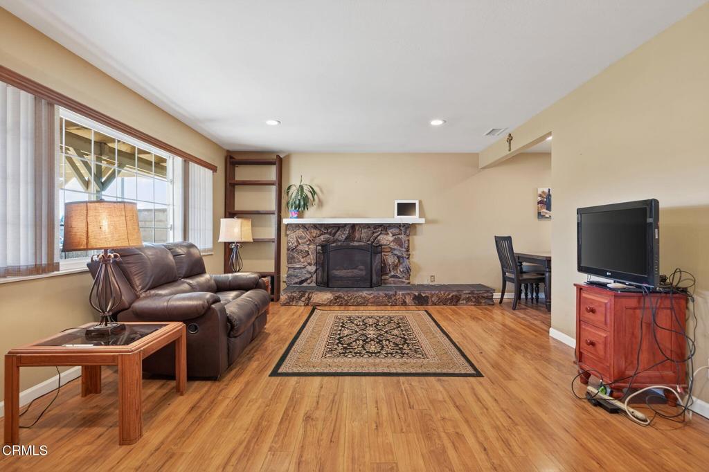 4029 South B Street Oxnard, CA 93033 - Photo 9 of 34 a living room with furniture and a flat screen tv