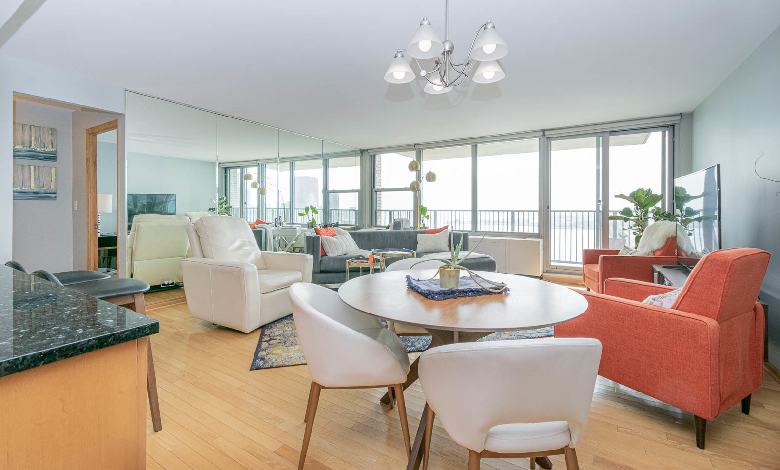 400 East Randolph Street, Unit 3405 Chicago, IL 60601 - Photo 3 of 17 a view of a dining room with furniture window and outside view