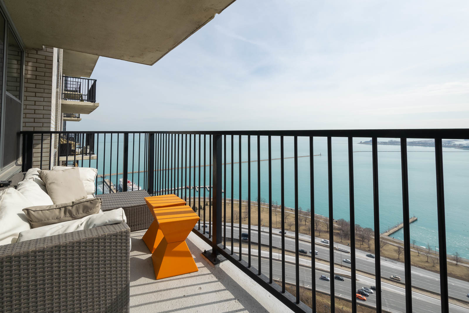 400 East Randolph Street, Unit 3405 Chicago, IL 60601 - Photo 10 of 17 a balcony with couch