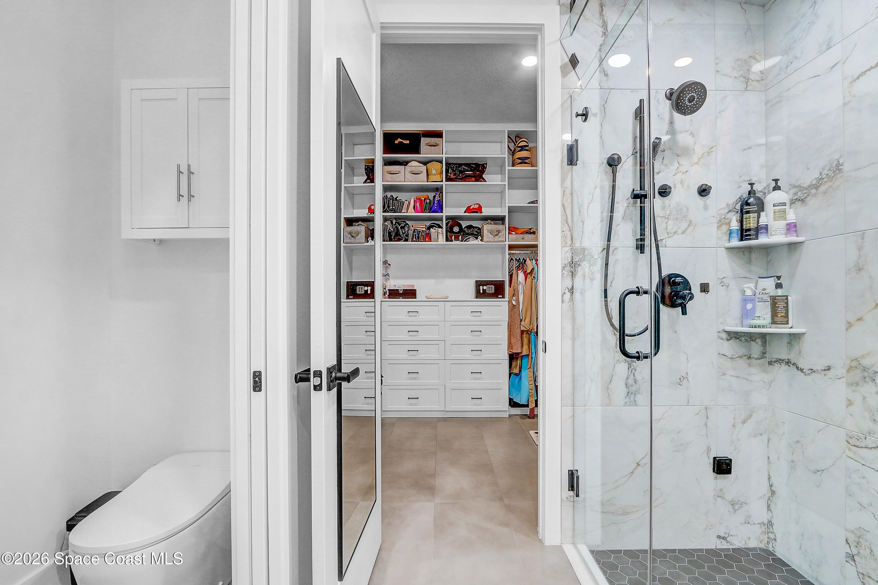 4225 Negal Circle Melbourne, FL 32901 - Photo 29 of 62 a bathroom with a shower