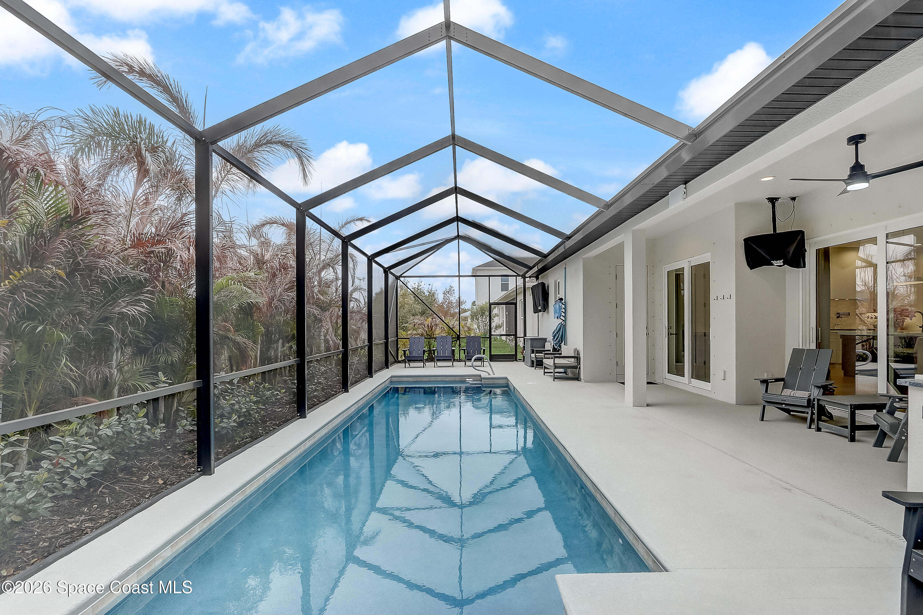 4225 Negal Circle Melbourne, FL 32901 - Photo 50 of 62 a view of swimming pool with seating area