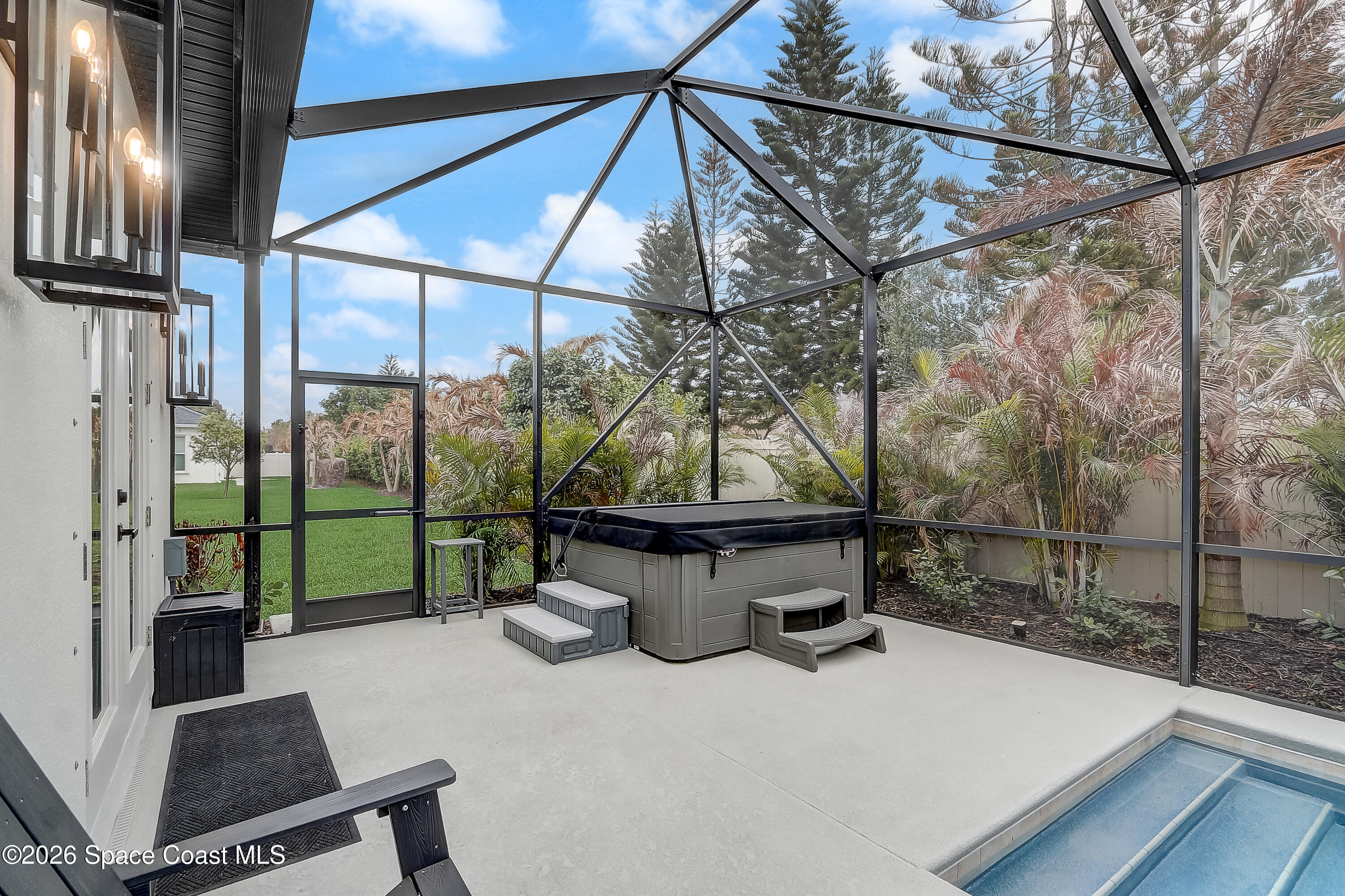 4225 Negal Circle Melbourne, FL 32901 - Photo 51 of 62 a view of backyard with outdoor seating