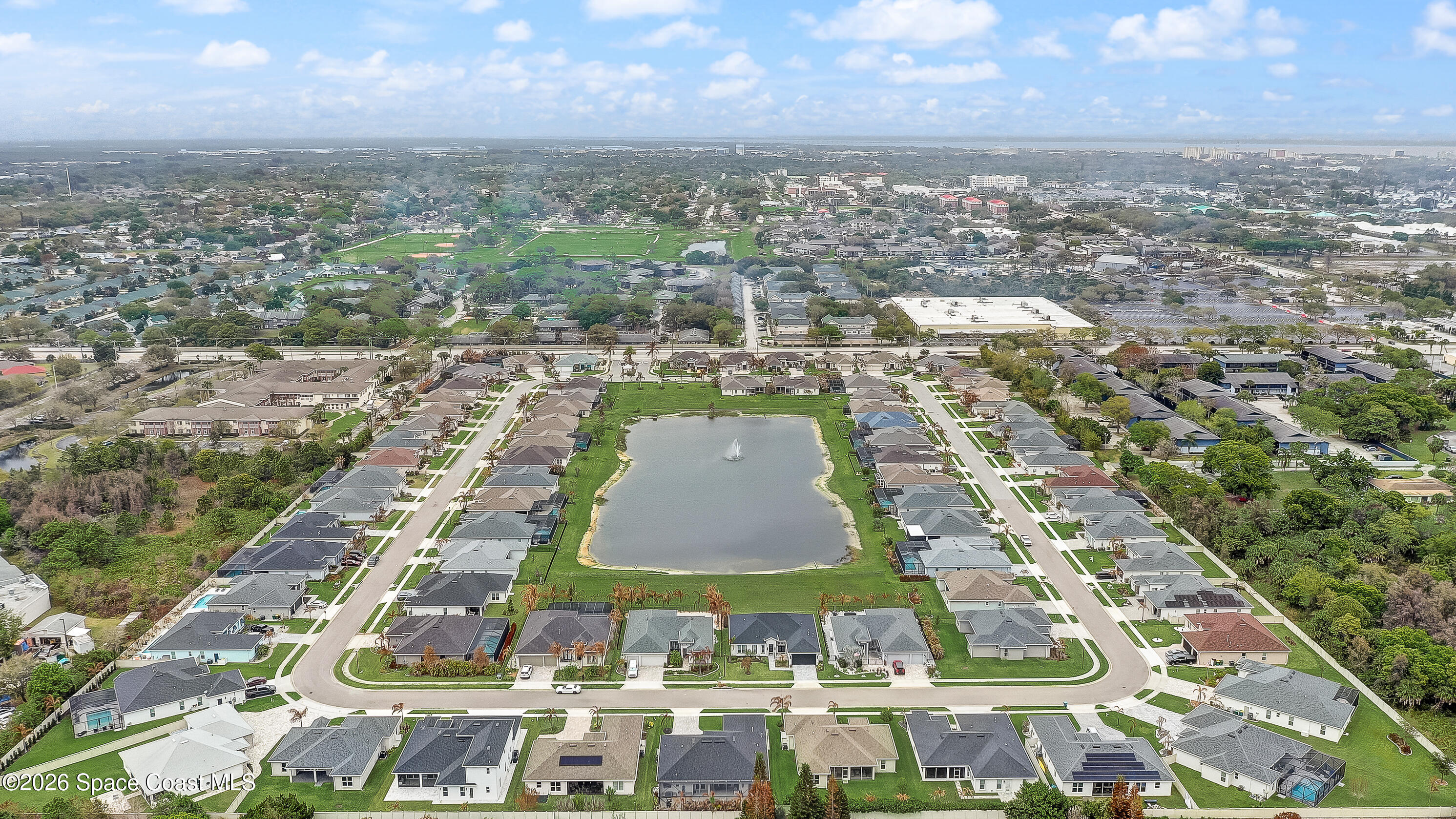 4225 Negal Circle Melbourne, FL 32901 - Photo 61 of 62 an aerial view of residential houses with outdoor space