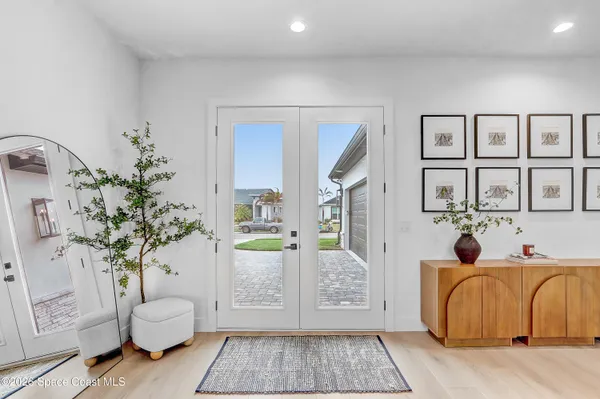 a view of swimming pool with seating area