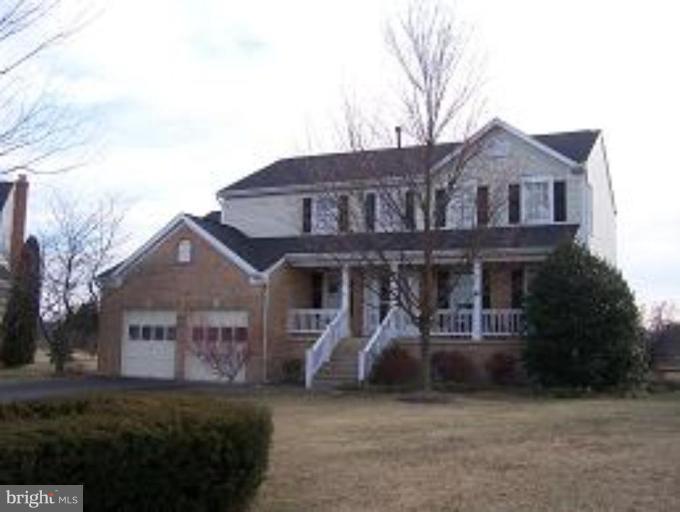 Front view with sweet front porch on cul-de-sac