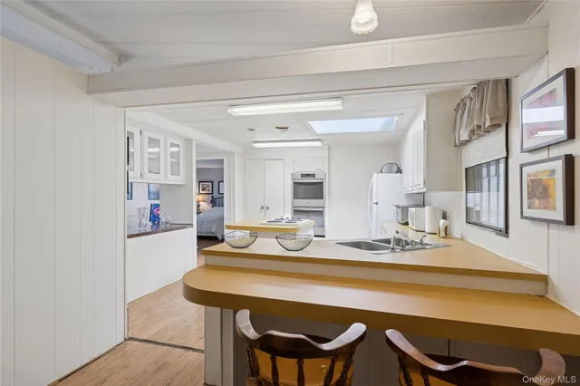 a dining room with a table and chairs