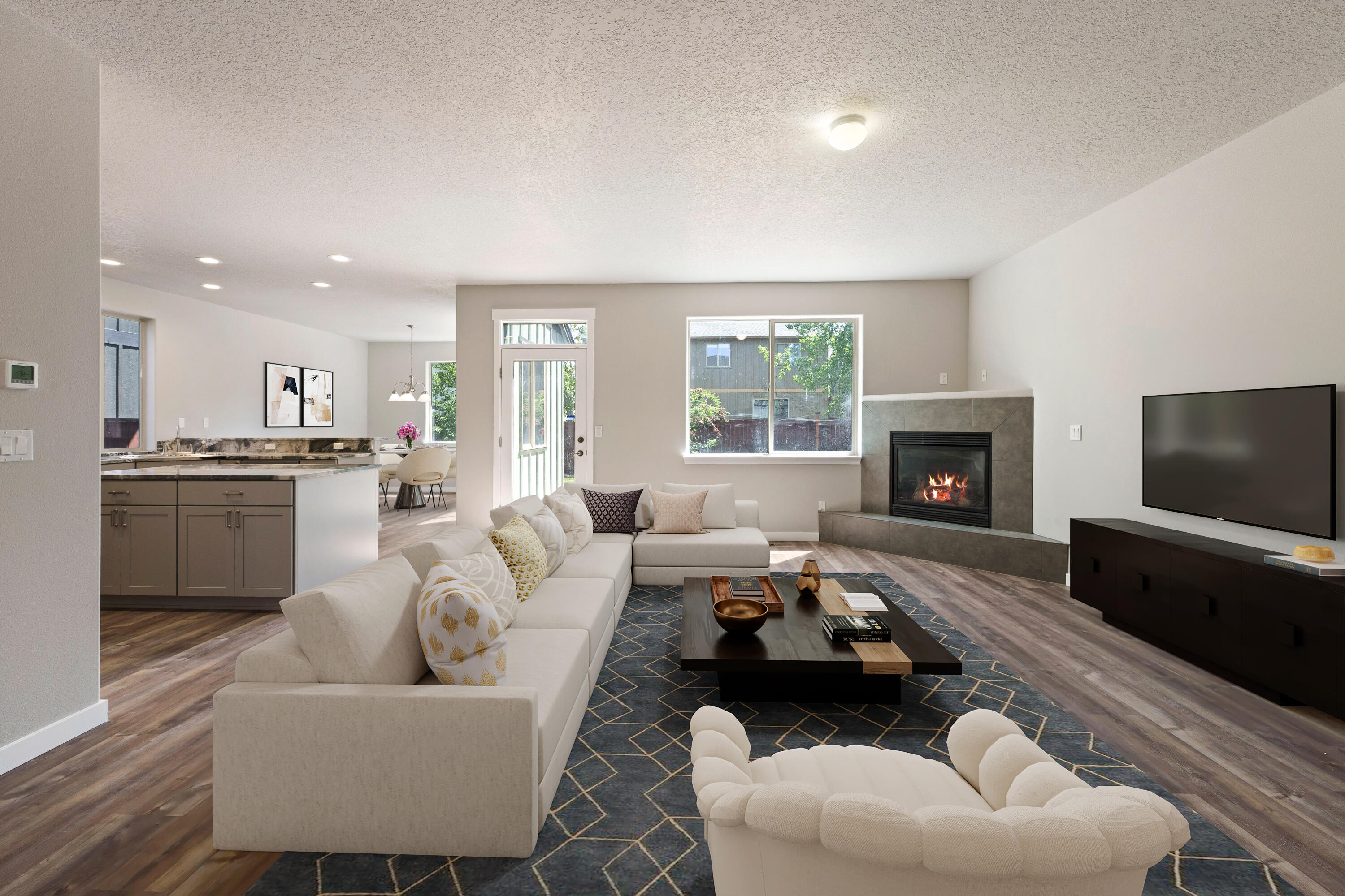 21189 Ritz Place Bend, OR 97702 - Photo 6 of 37 a living room with furniture and a fireplace