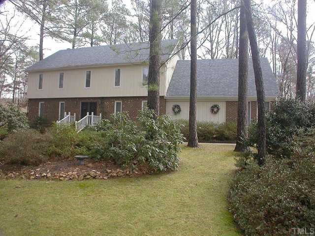 8708 Fort Macon Court Raleigh, NC 27615 - Photo 1 of 1 a view of a house with a garden