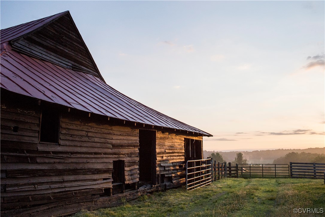 2427 South Blue Ridge Turnpike Rochelle, VA 22738 - Photo 35 of 50 Property exterior at dusk featuring an outbuilding
